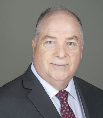 Portrait of Jim Cherney, Realtor.